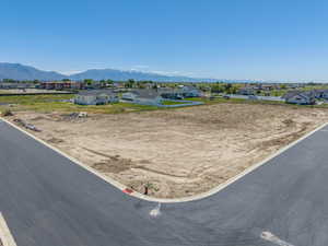 Expansive corner lot featuring a level, cleared building site