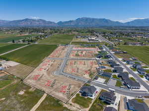 Aerial perspective showcasing a developing residential subdivision with clearly delineated parcels