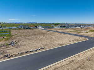 Newly paved streets with curb infrastructure in a developing community
