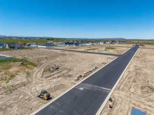 New residential development featuring paved roads and visible curb lines