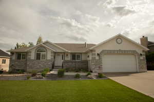 Stucco exterior with stone veneer accents