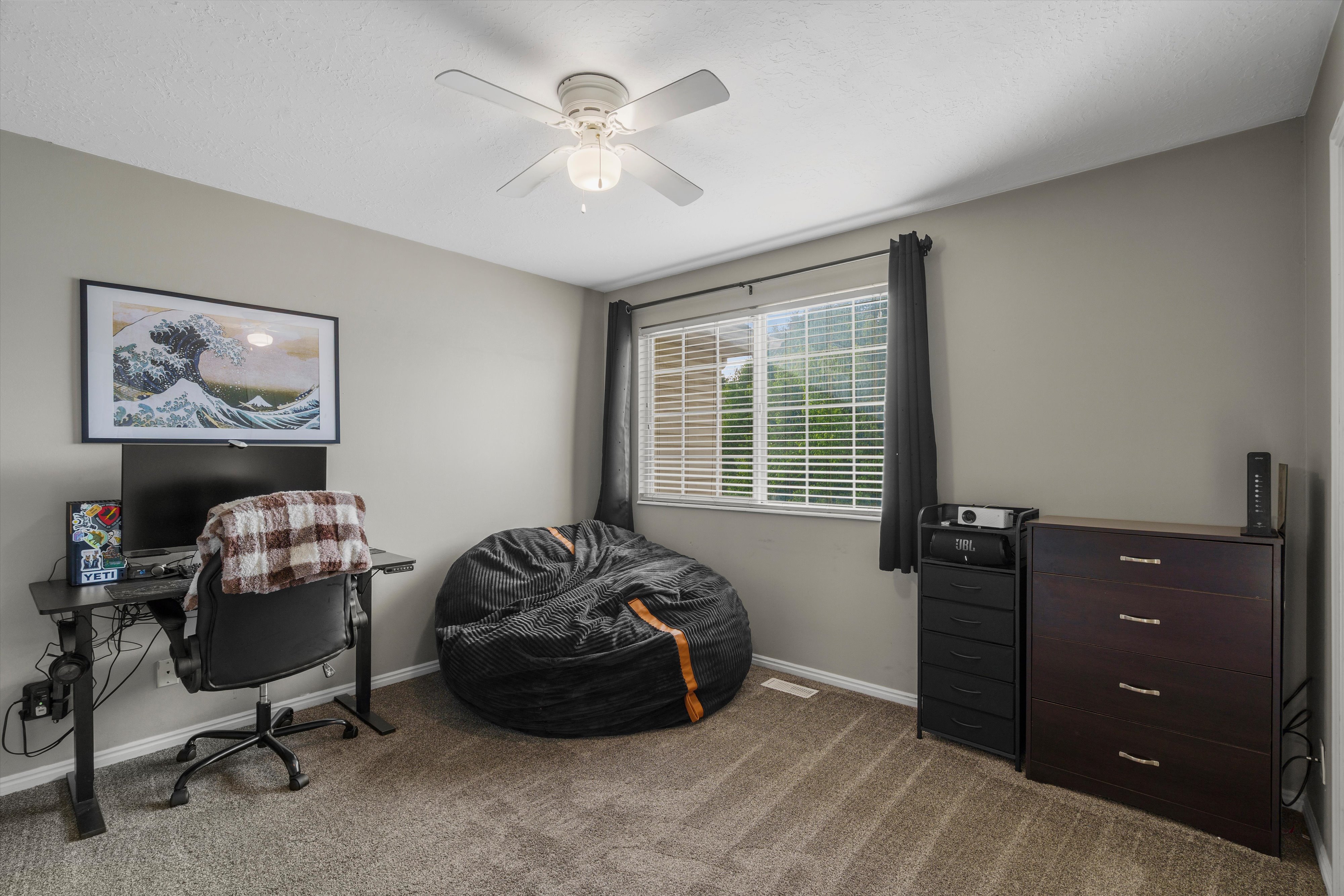 Second bedroom features a walk in closet