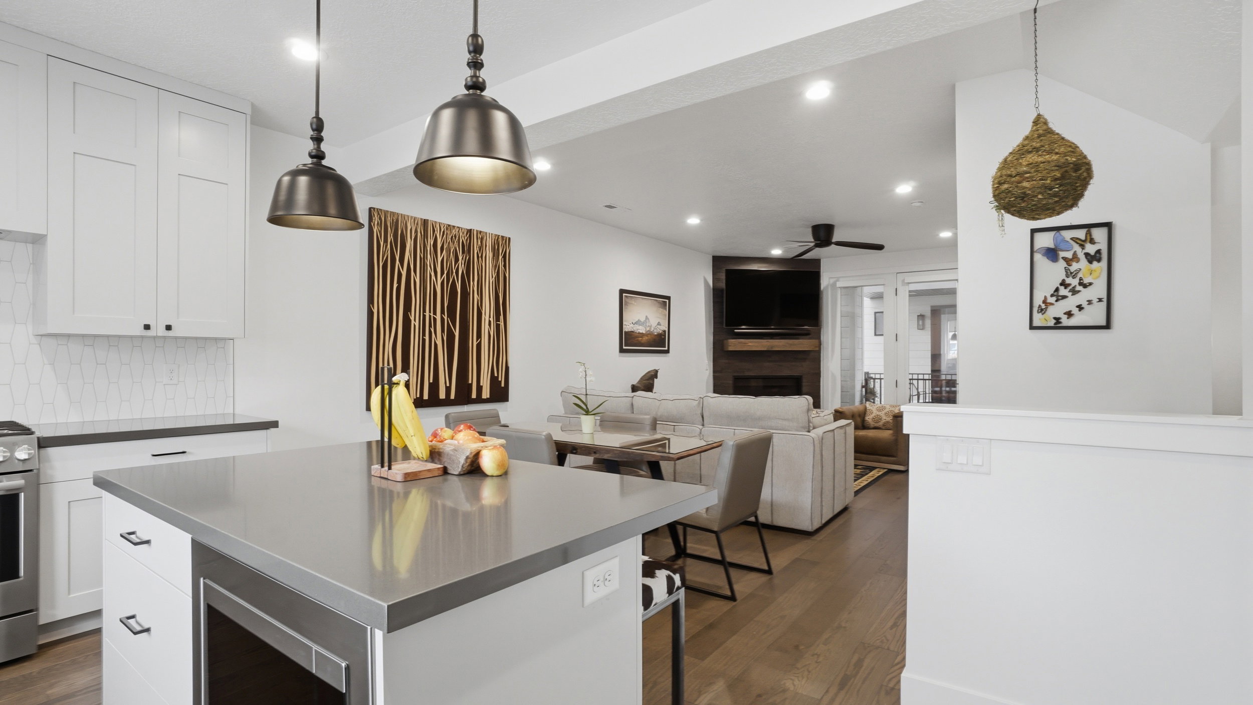 Modern kitchen island with a stone countertop and integrated storage