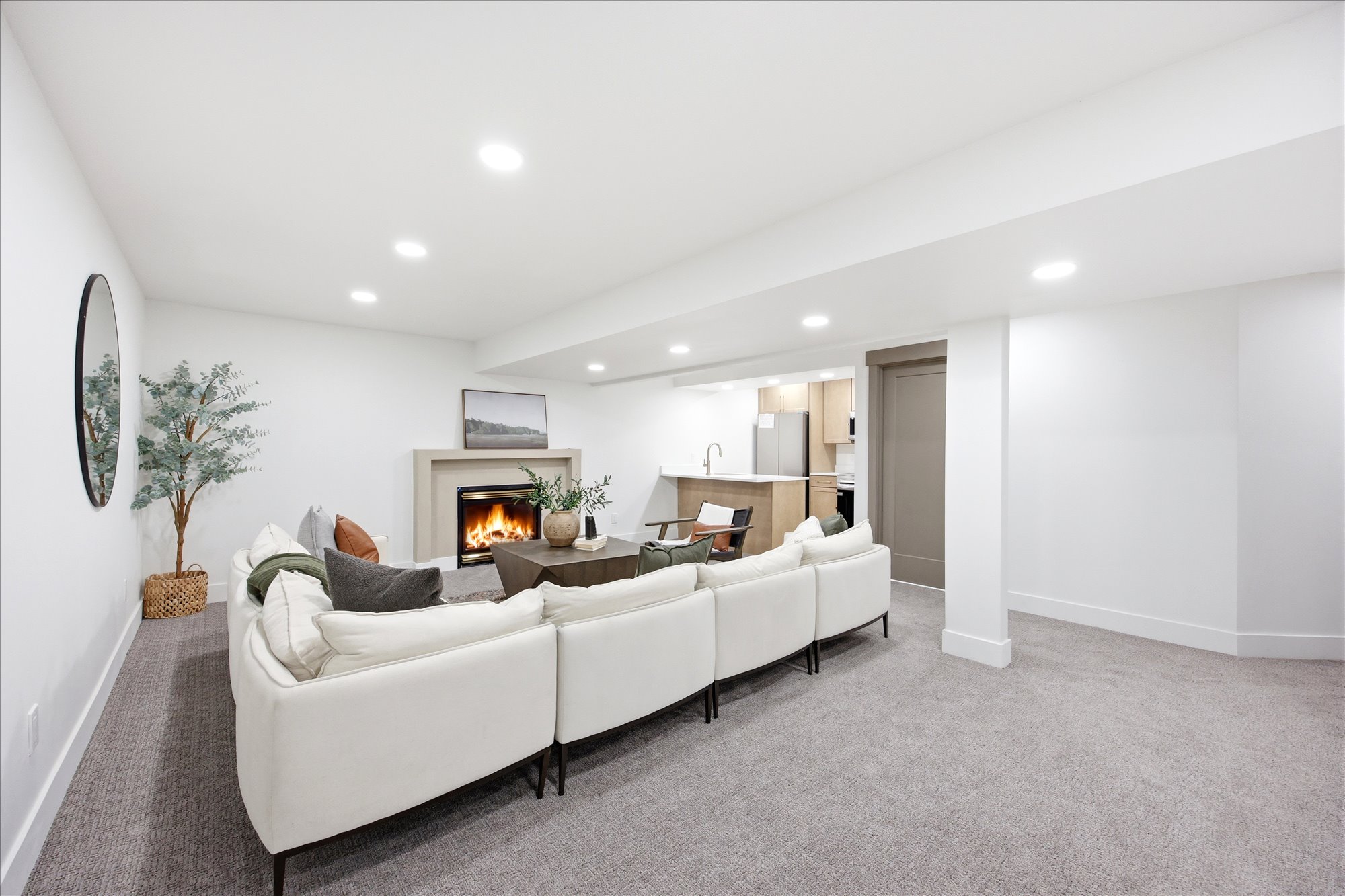 Spacious living area featuring recessed lighting and wall-to-wall carpeting