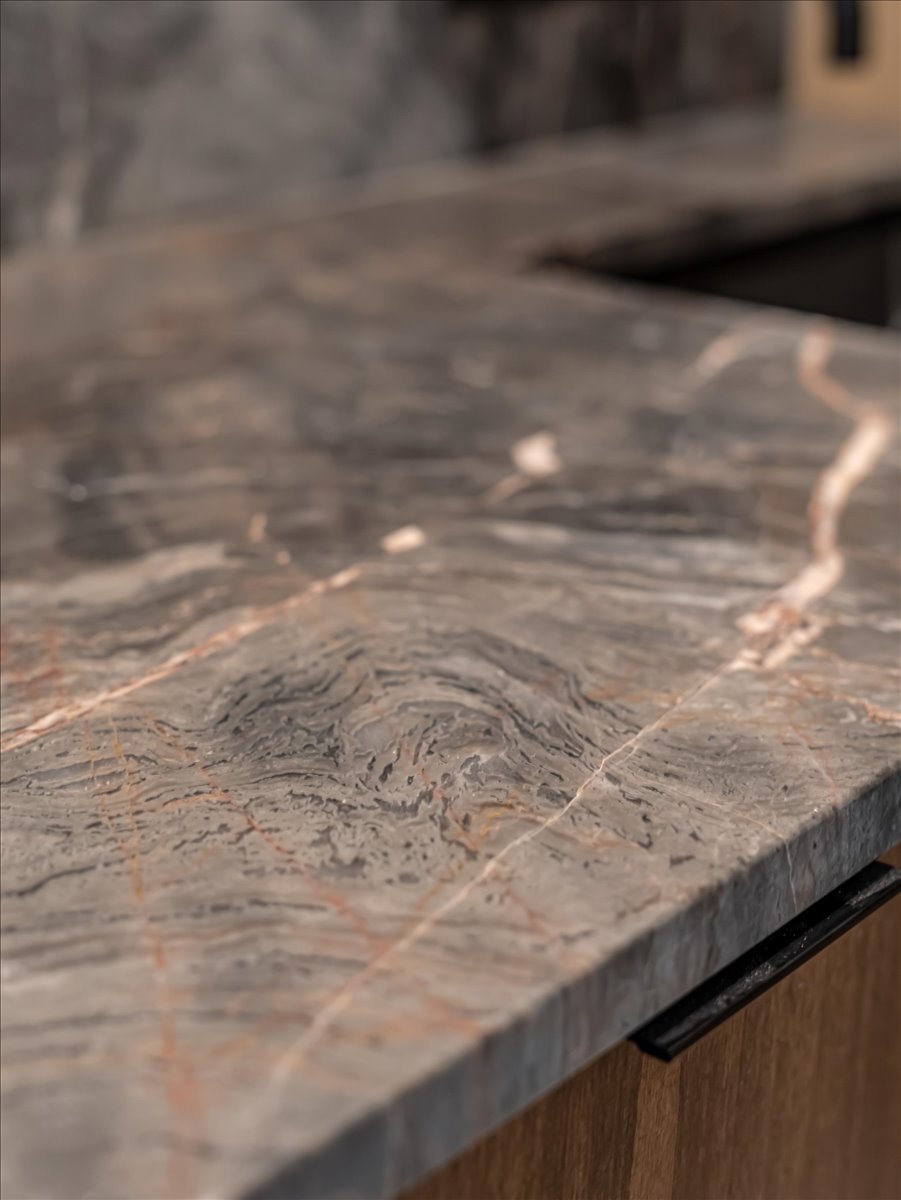 Stone countertop featuring intricate veining
