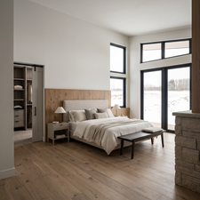 Spacious room featuring high ceilings, wood-finish flooring, a built-in wood headboard, and a stone-clad architectural element. Rendering using AI as home is under construction.