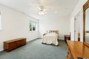 Room featuring light-colored walls and green carpet flooring