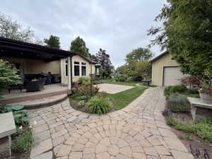 Paver patio and walkways with integrated landscaping
