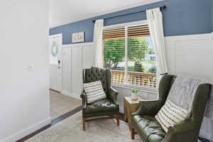 Board and batten accent wall with a contrasting blue upper wall