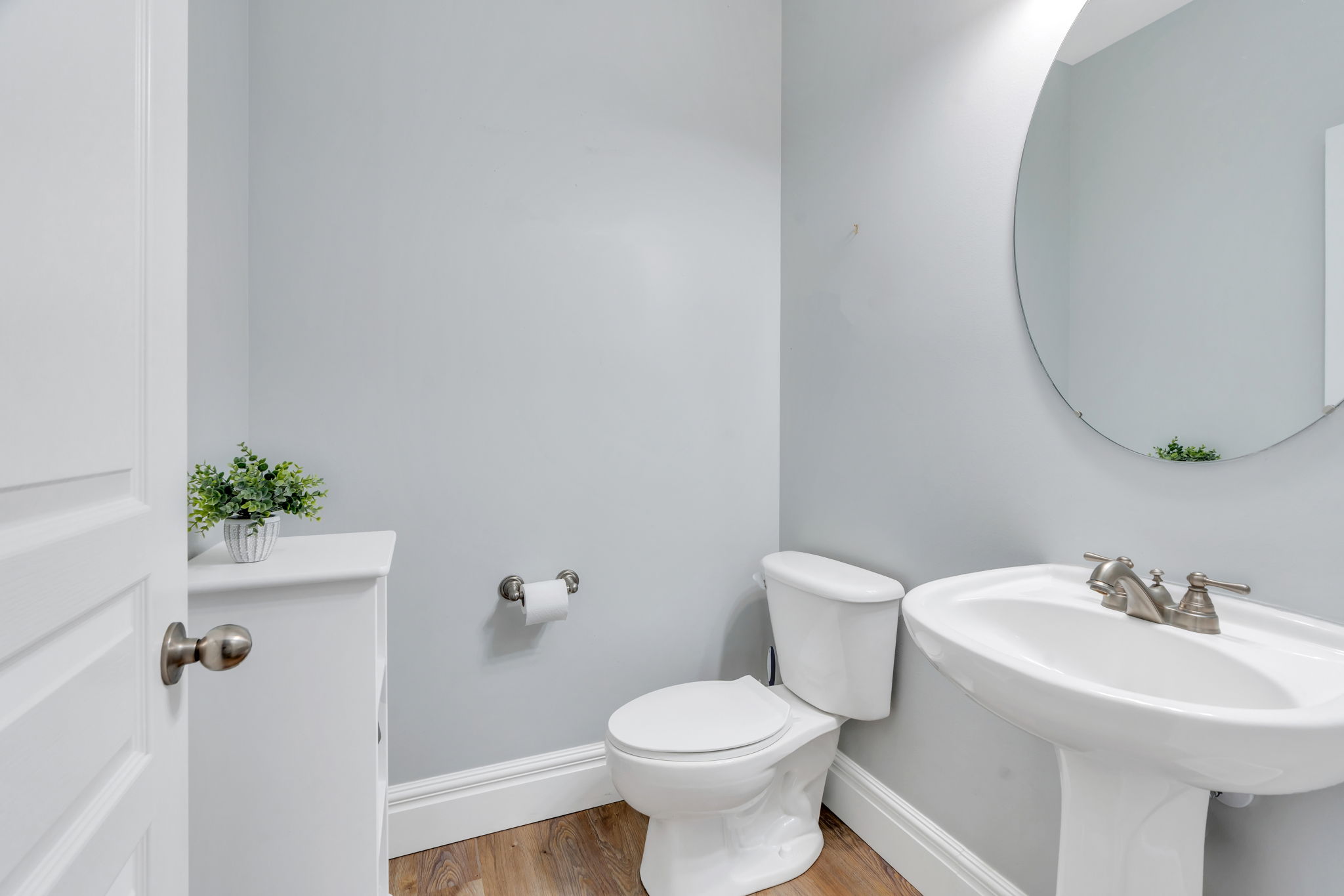 Convenient half bath off the entry.