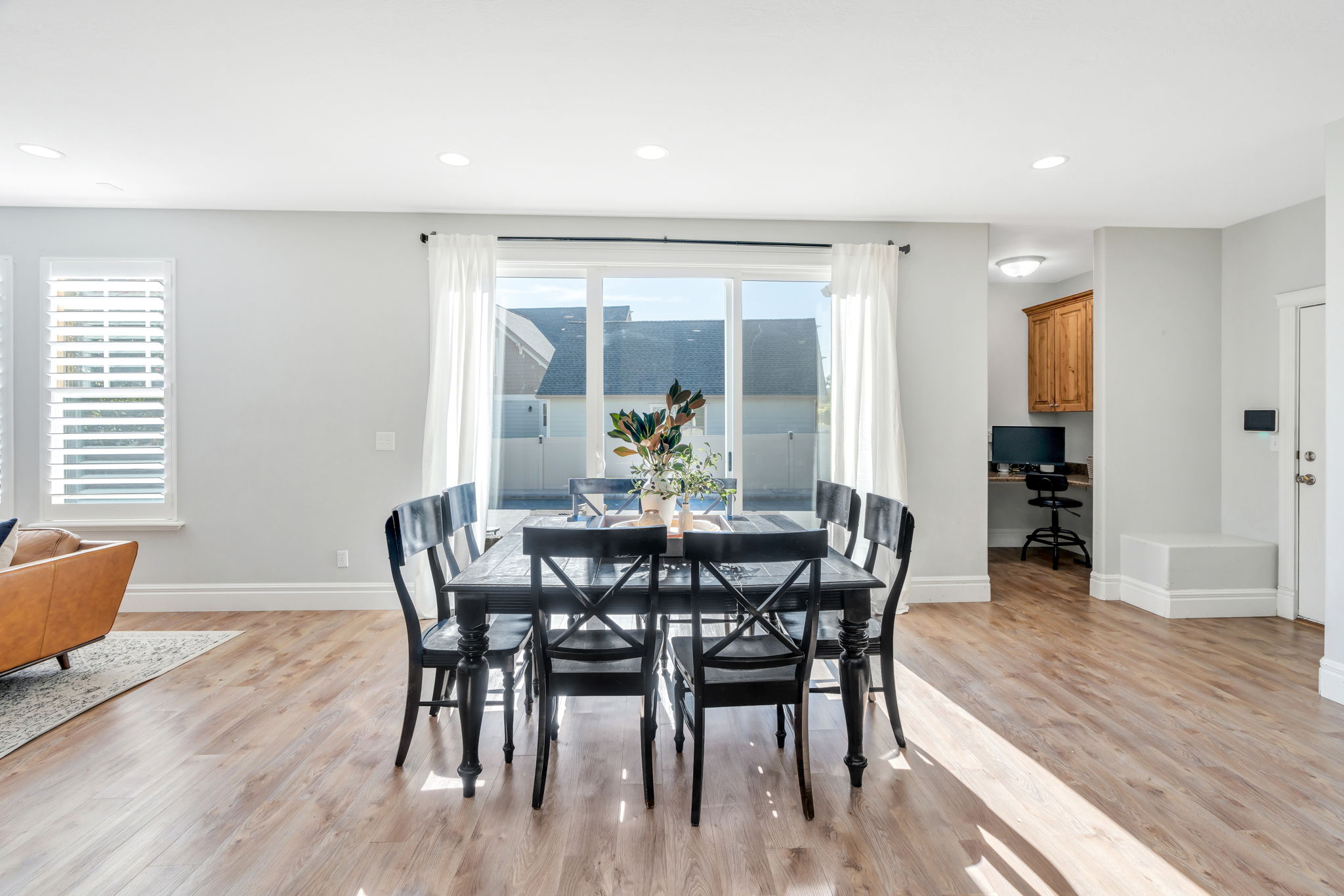Dining area with recessed lighting, and built in study nook