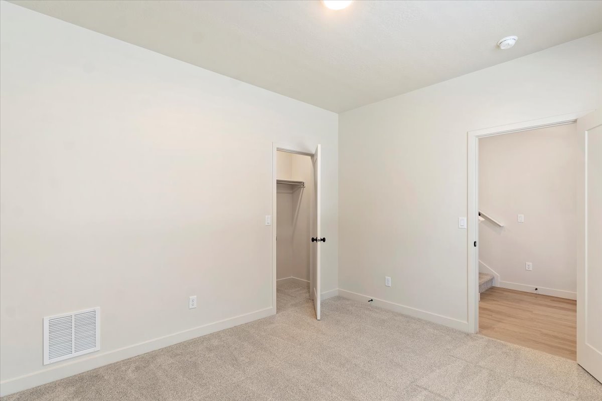Neutral tone wall paint with baseboard trim