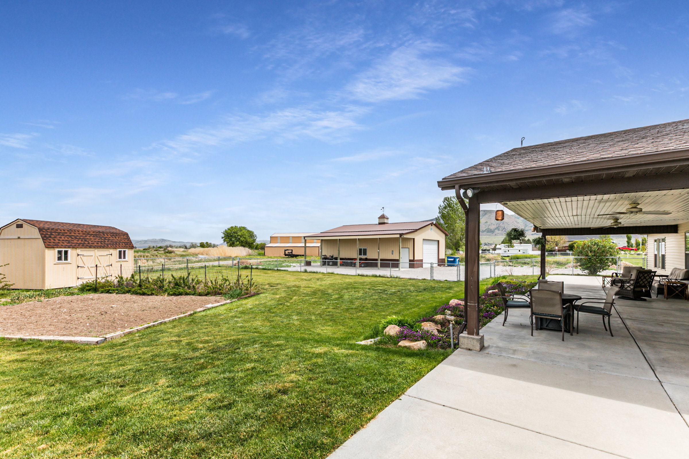 Expansive covered patio with concrete flooring