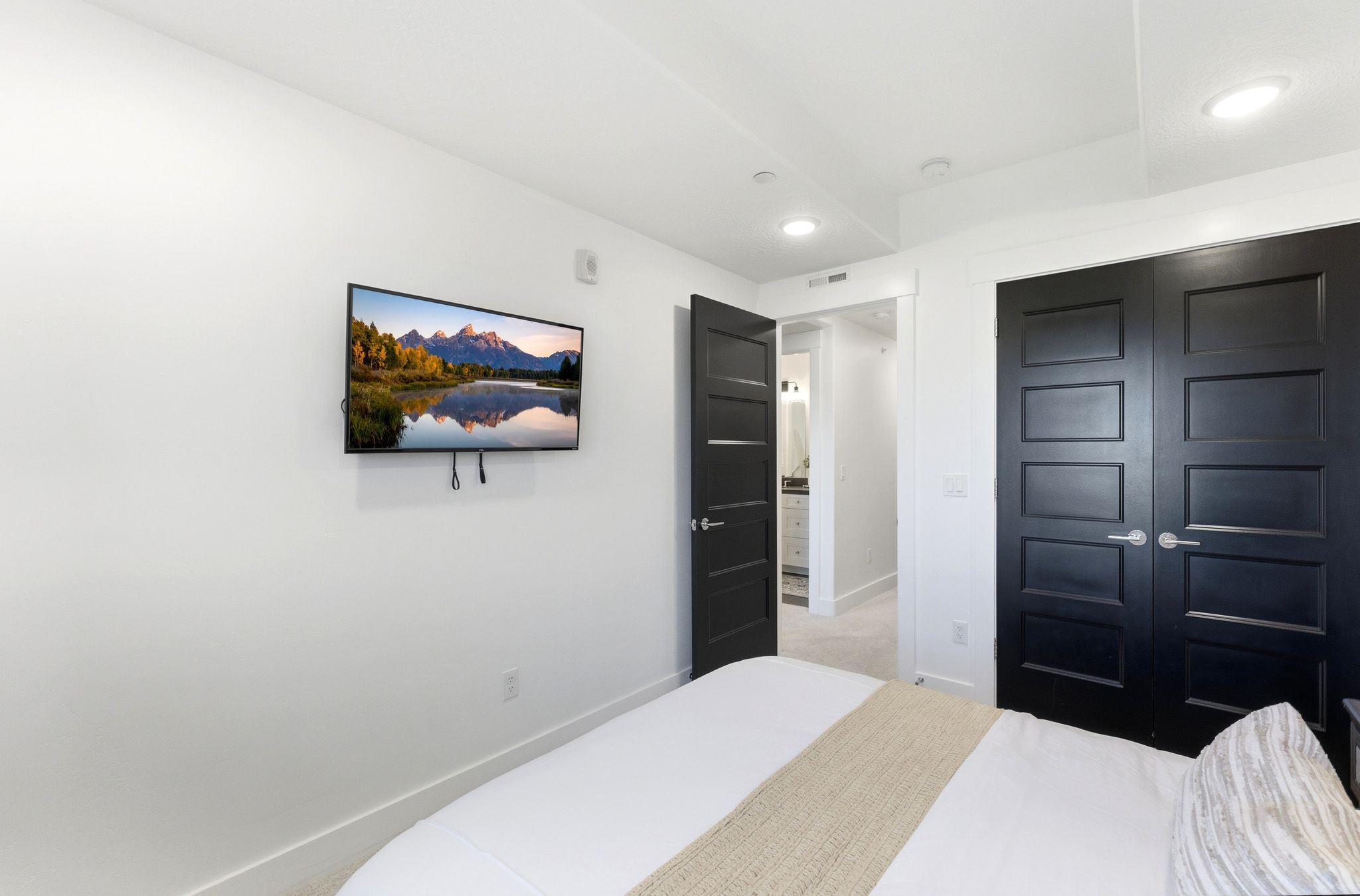 Interior room featuring white walls, recessed lighting, and light-colored flooring