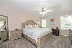 Spacious room featuring neutral wall tones and plush carpeting