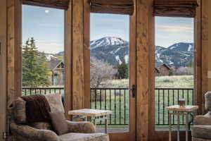 Doorway featuring a mountain view