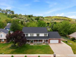 Large .34 acre lot with 4 car garage (extra wide and deep) and additional RV pad