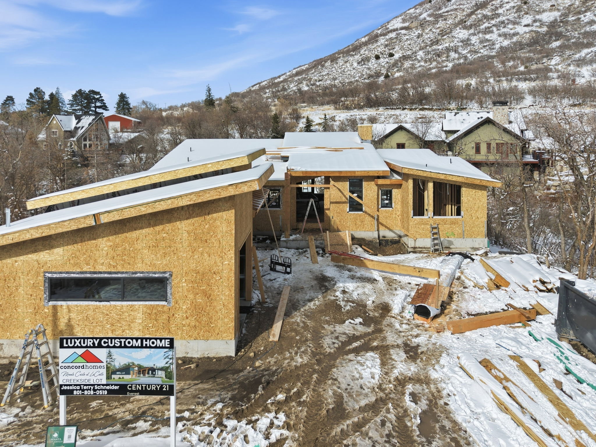 New construction featuring a contemporary architectural design with multiple rooflines and a framed structure