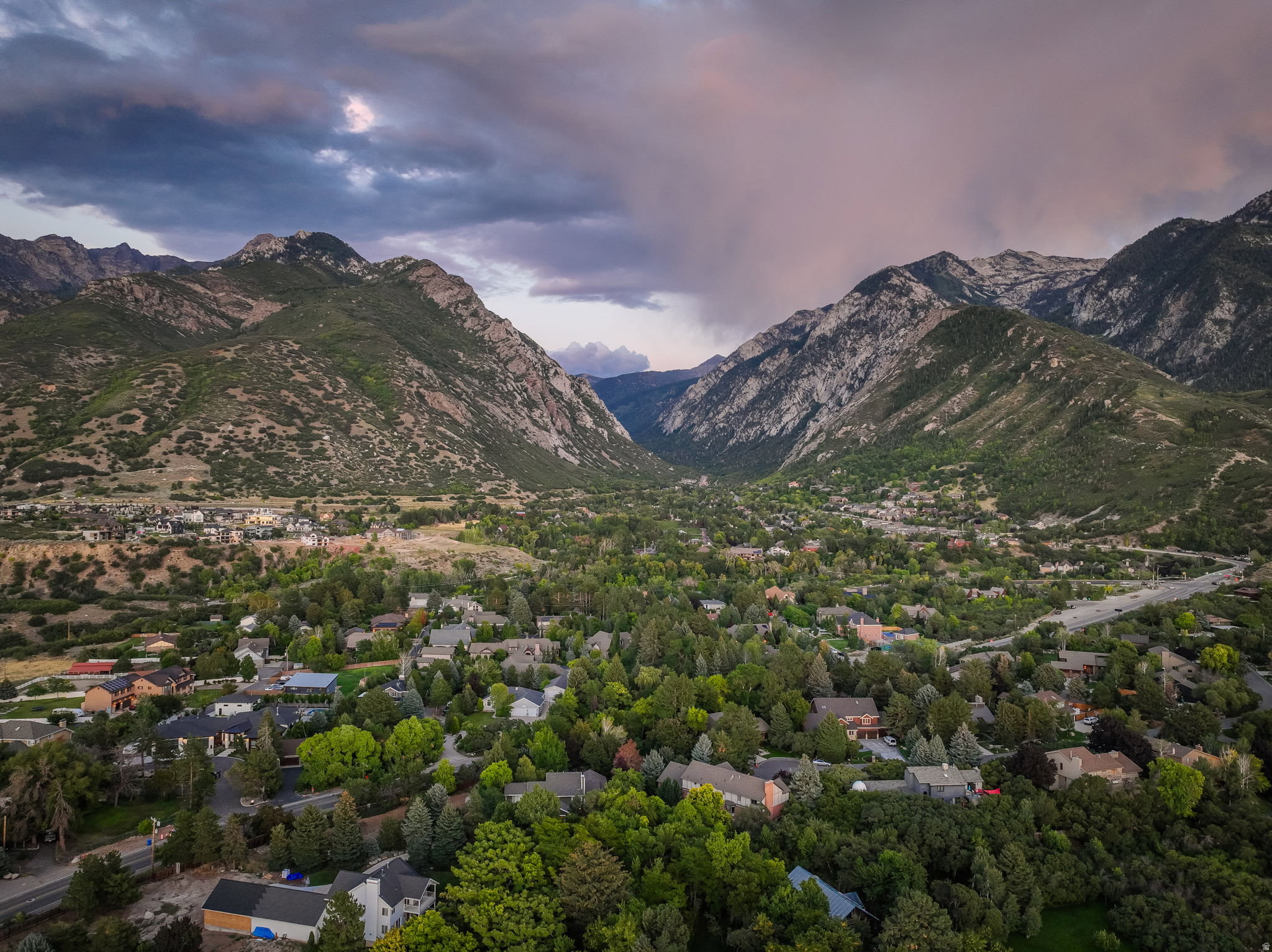 Expansive residential area nestled within a mountainous landscape