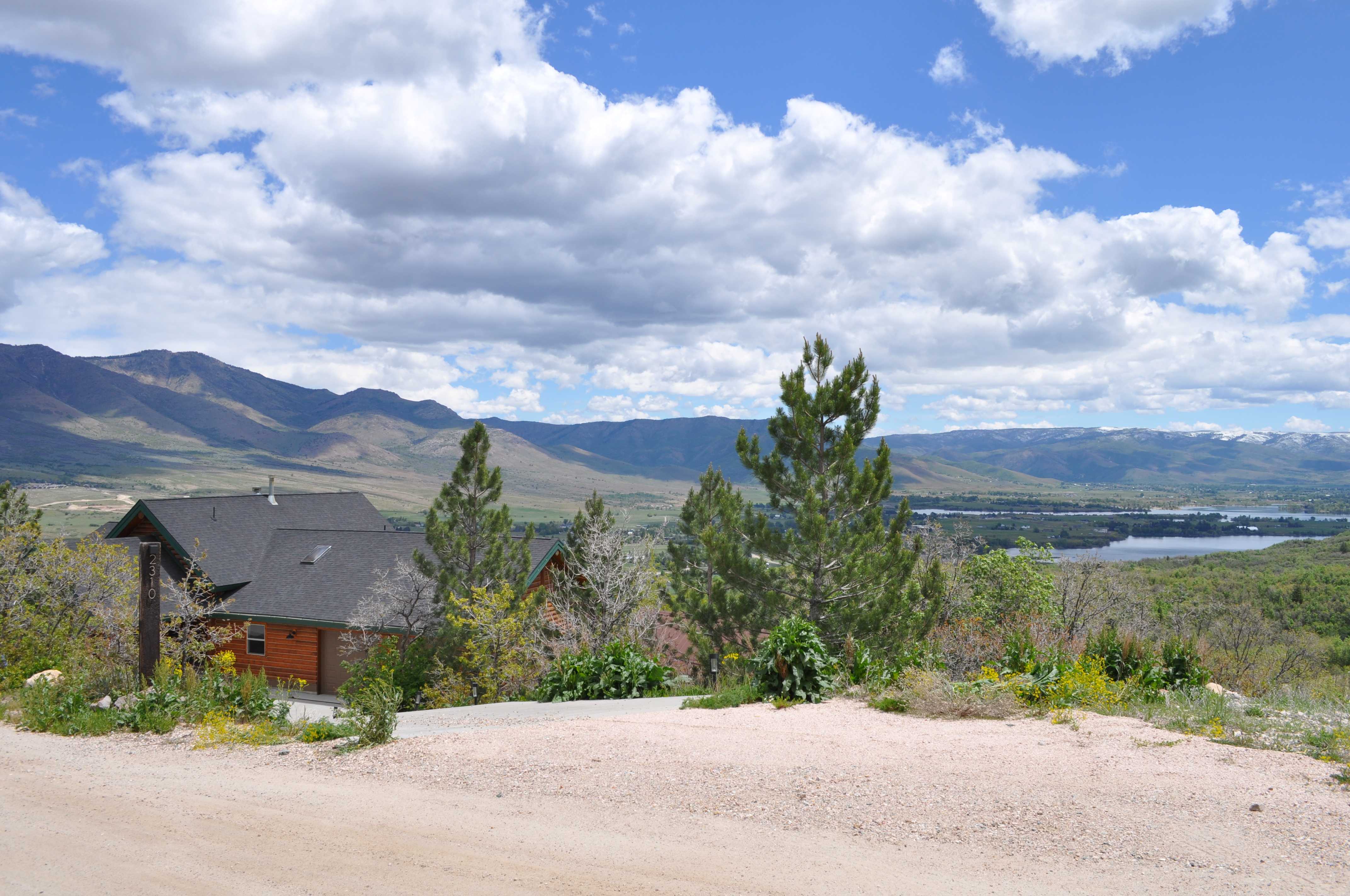Mountain backdrop with distant body of water