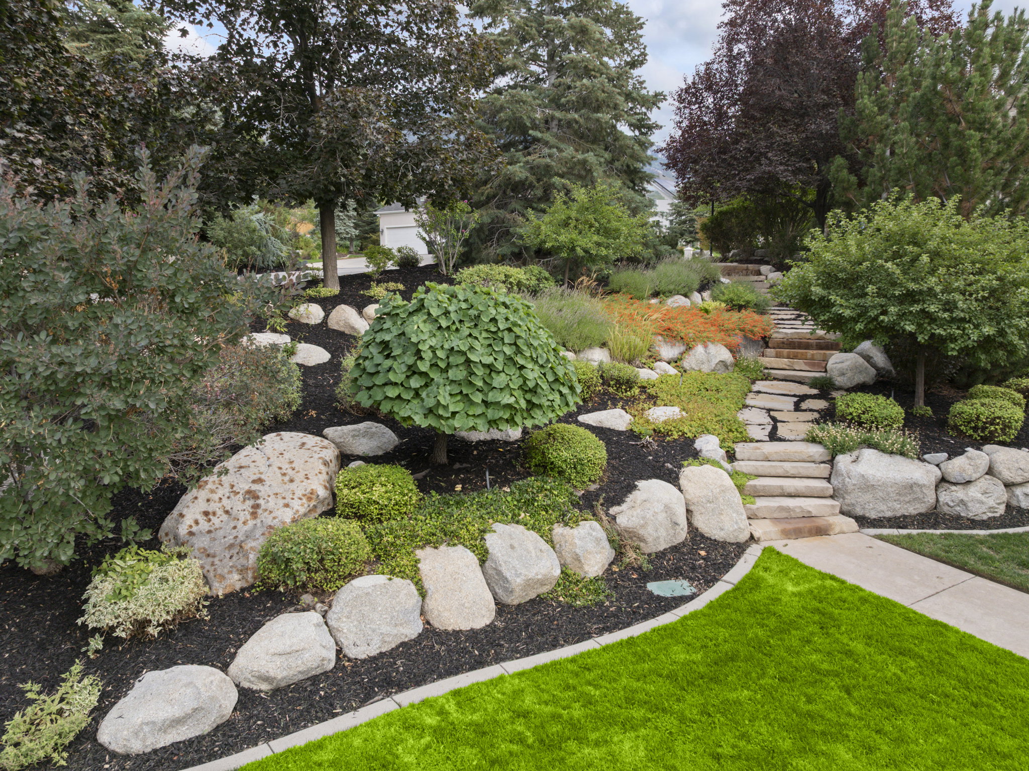 View of green lawn with stairs