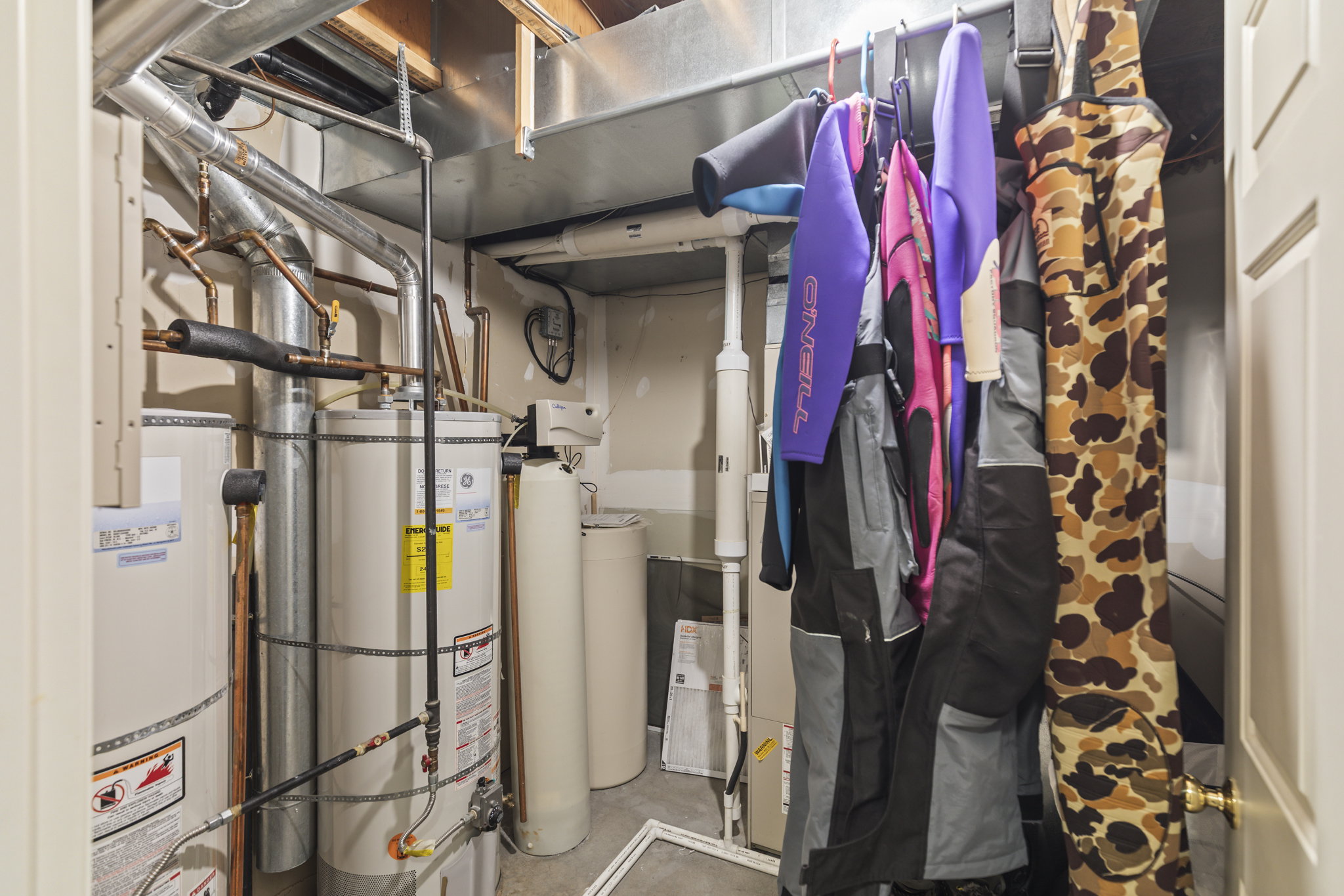 Utility room with gas water heater