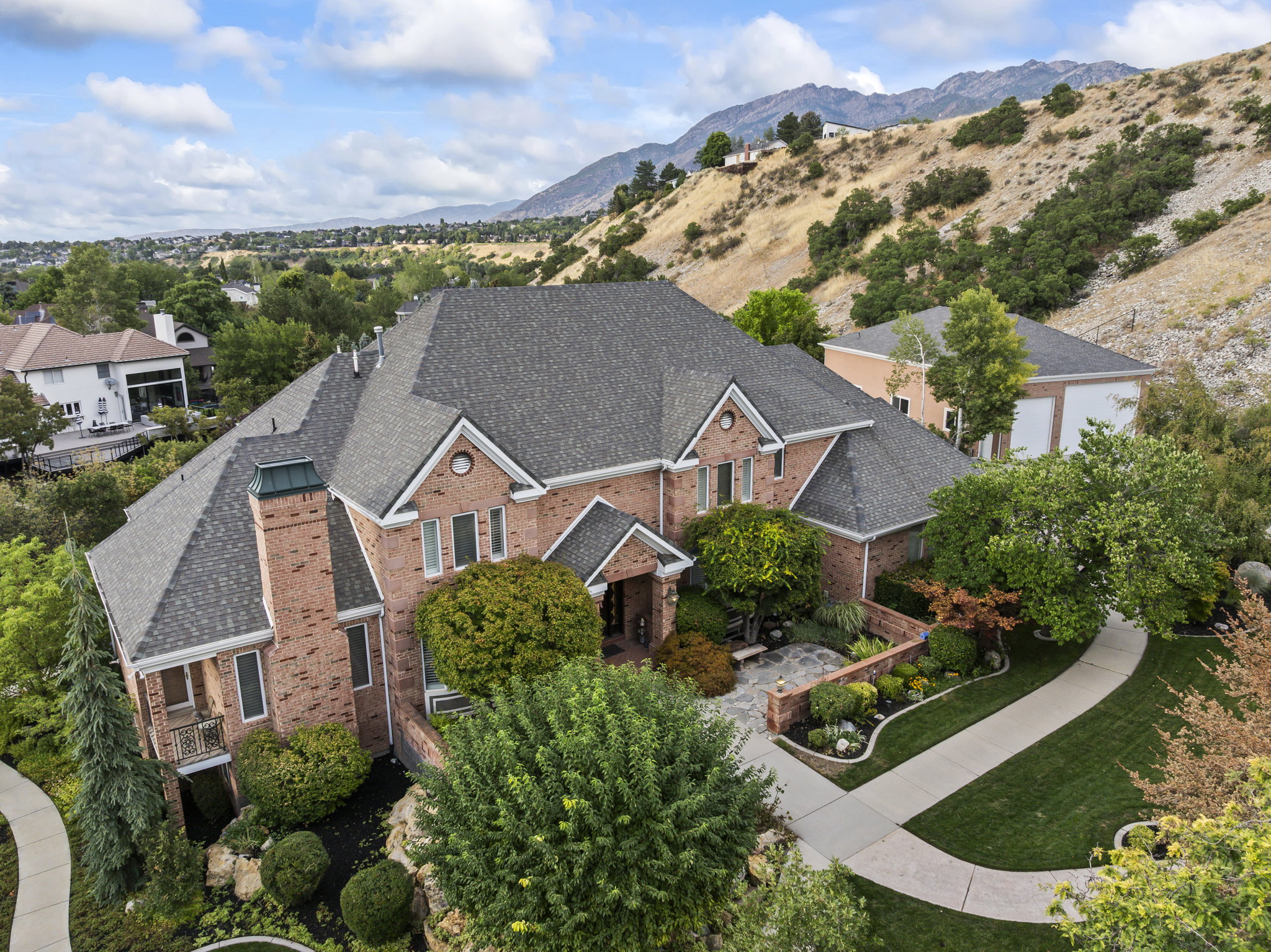 View of subject property with a mountainous background