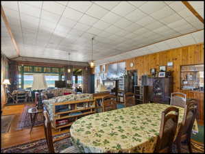 Great room and overflow dining with view of Bear Lake in the background