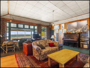 Expansive windows offer water frontage view