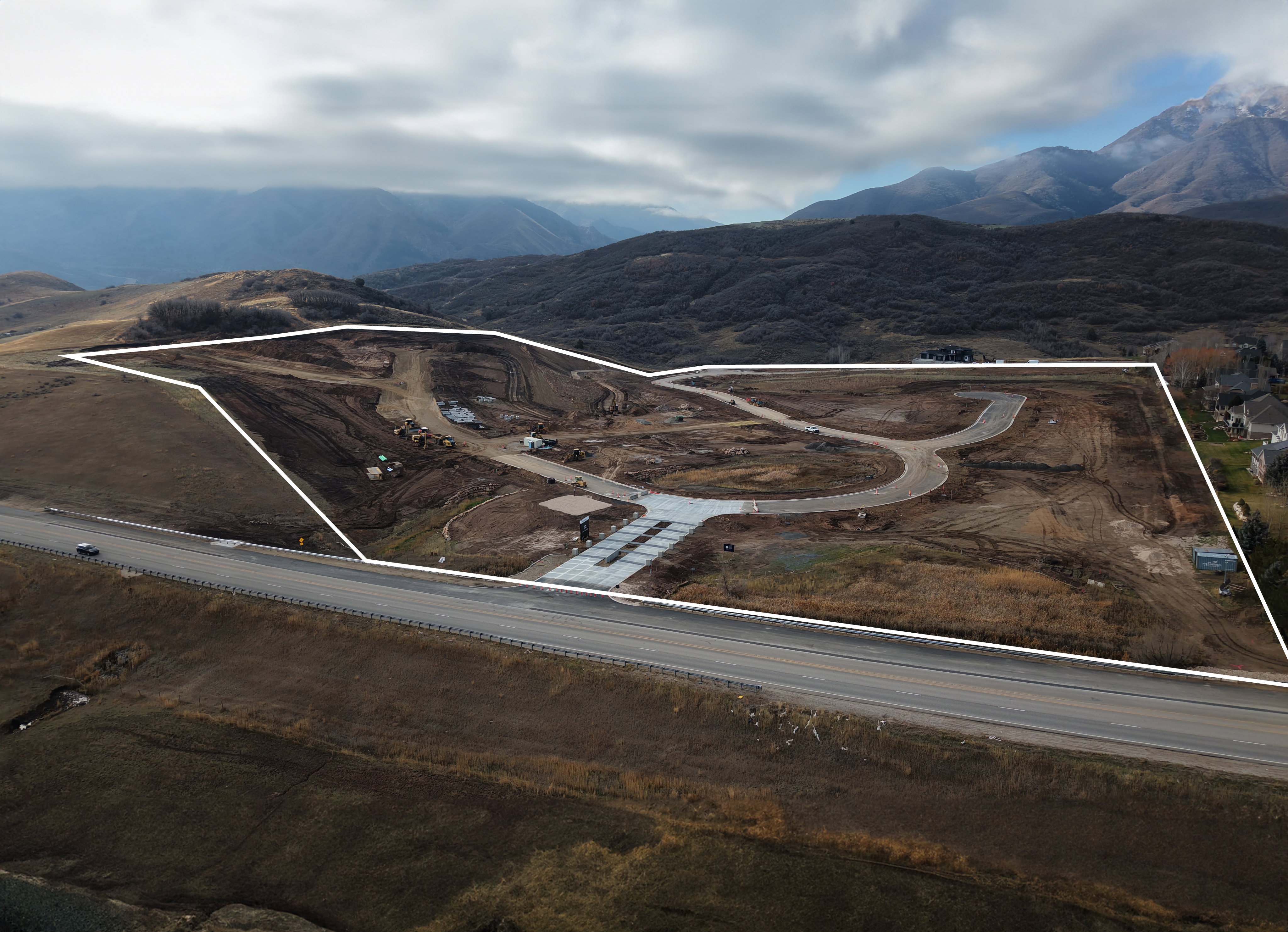 Developing land parcel with graded roads and cul-de-sac