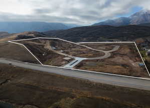 Developing land parcel with graded roads and cul-de-sac