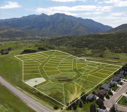 Aerial overview of a developed subdivision featuring demarcated lots and existing residential structures
