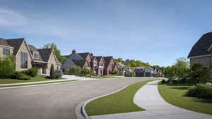 Paved streets and sidewalks wind through a neighborhood featuring varied architectural styles