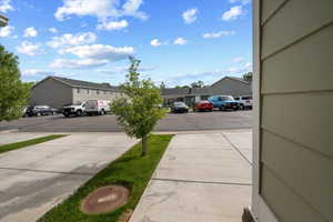 Paved concrete driveways with interspersed grassy strips