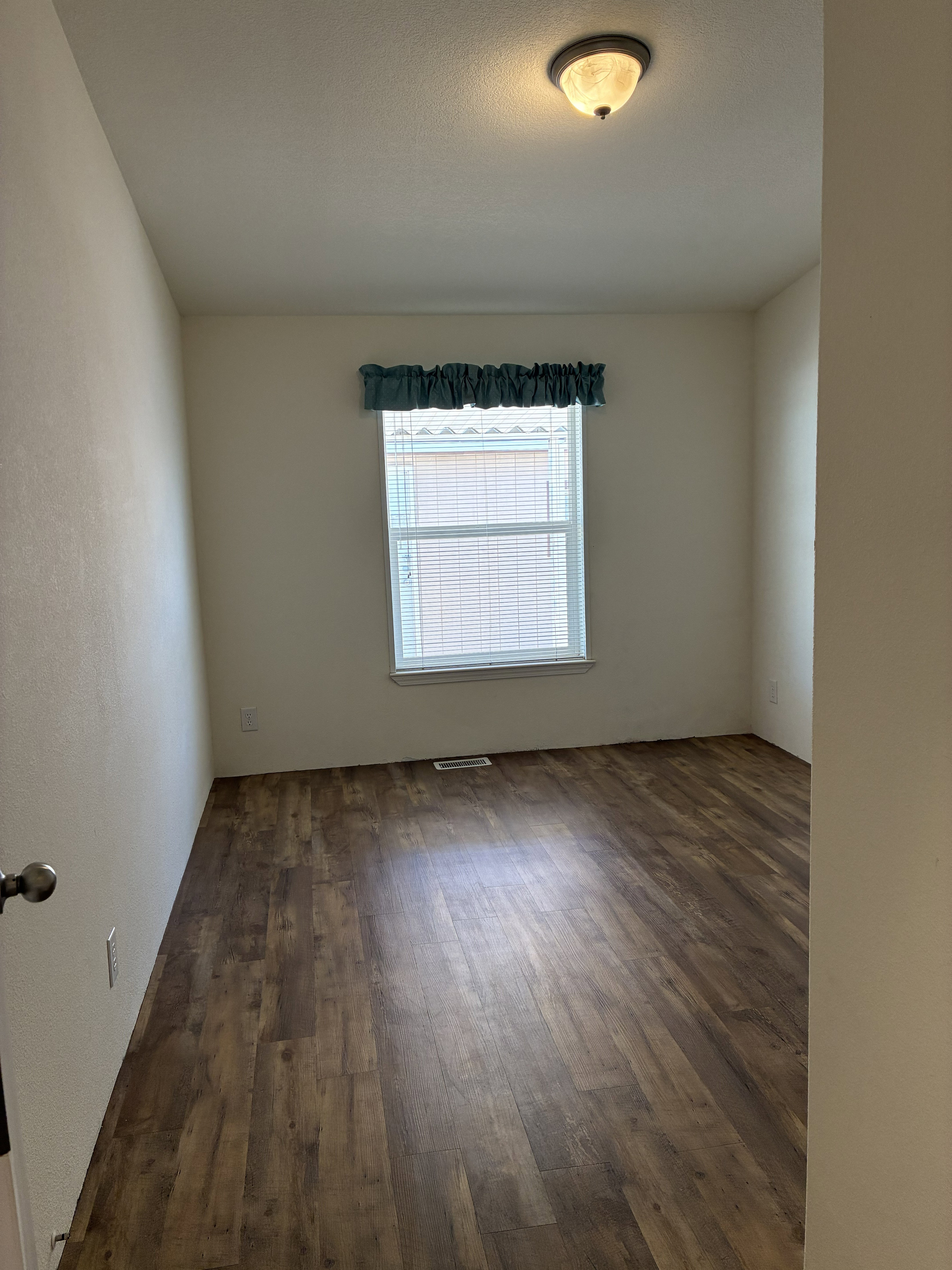 Bedroom 3 with LVP flooring