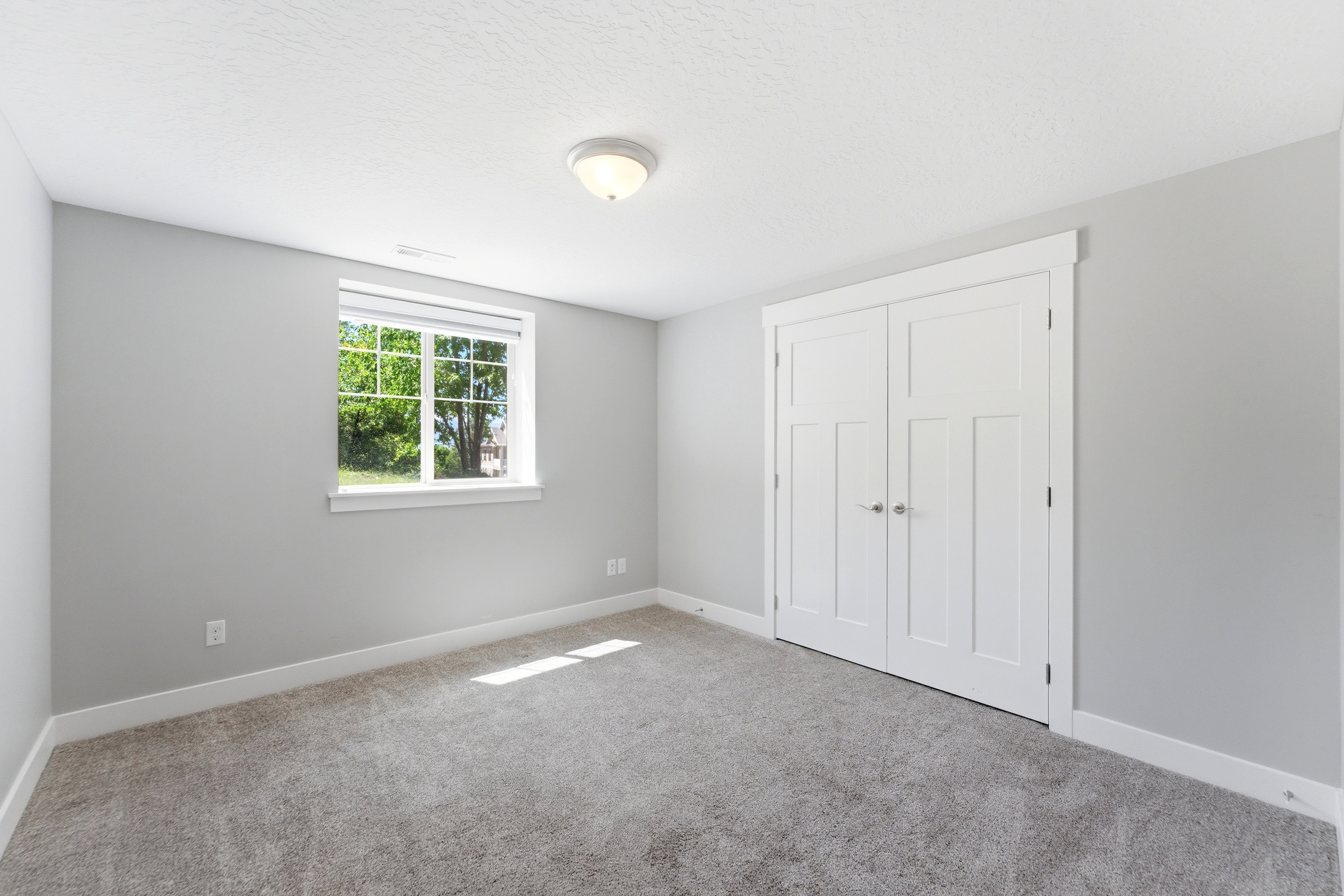 Interior room with light gray walls and white trim