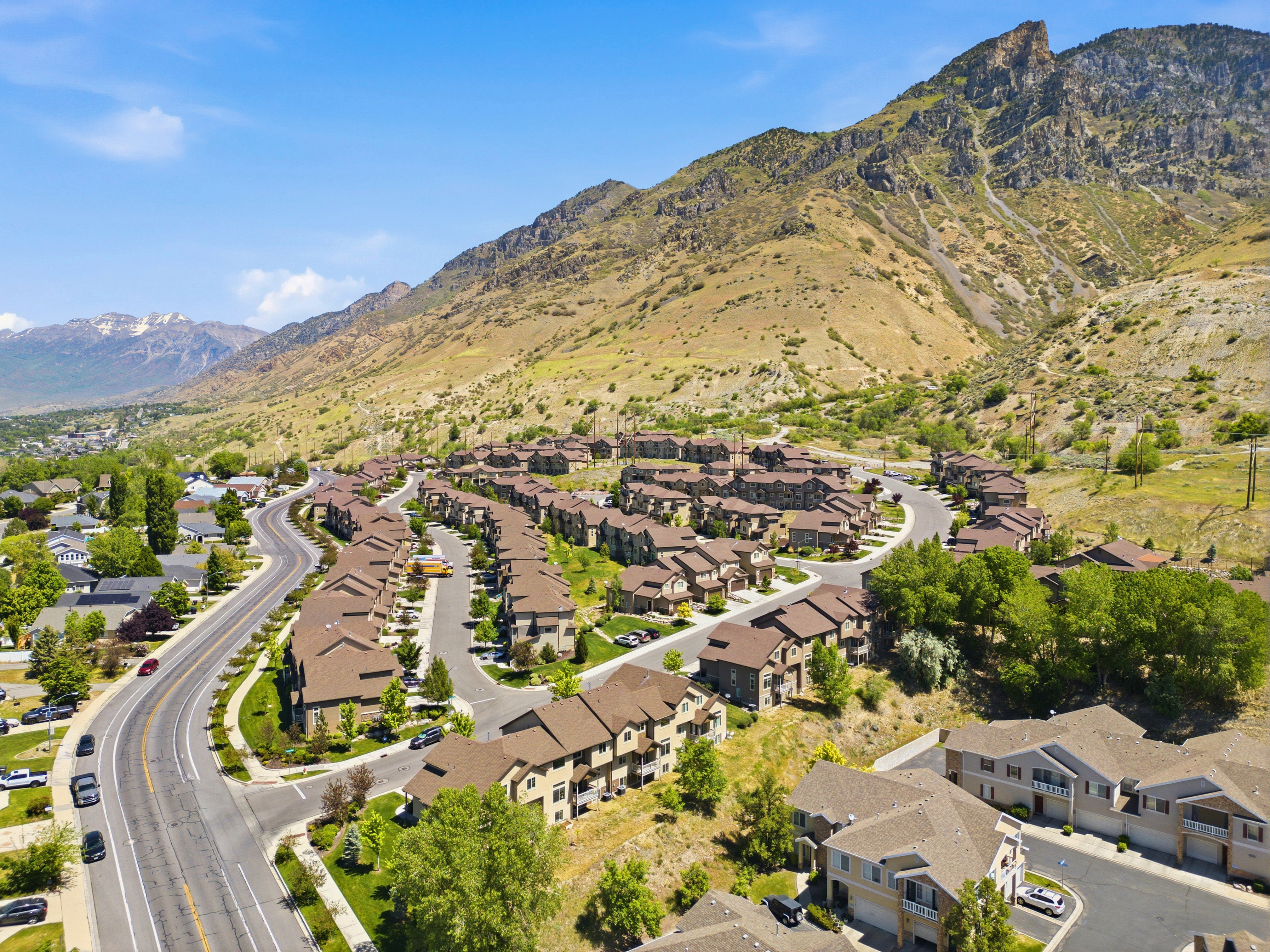 Residential community situated at the base of a rugged mountain range