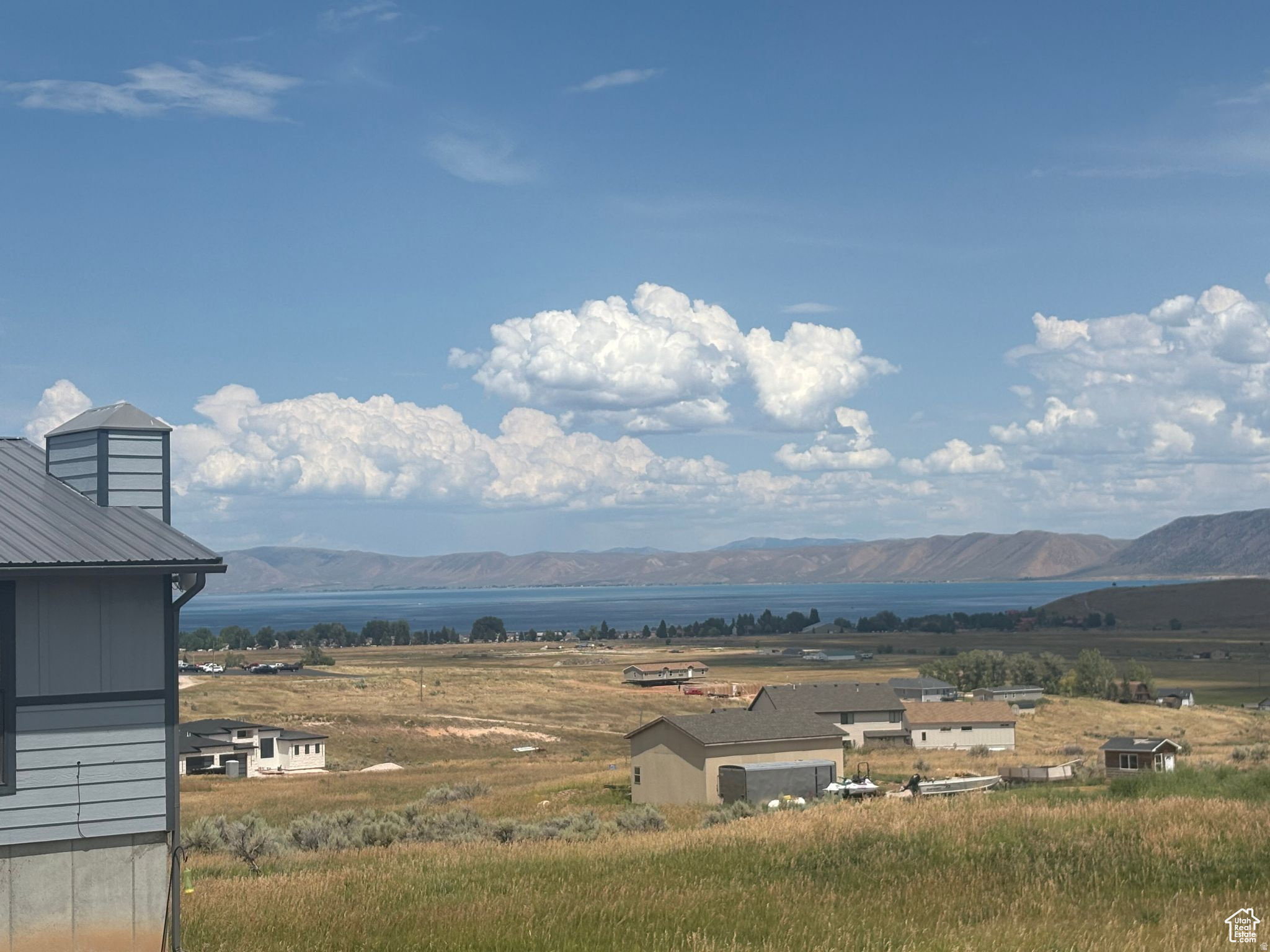 Lakefront scenery with distant mountain backdrop