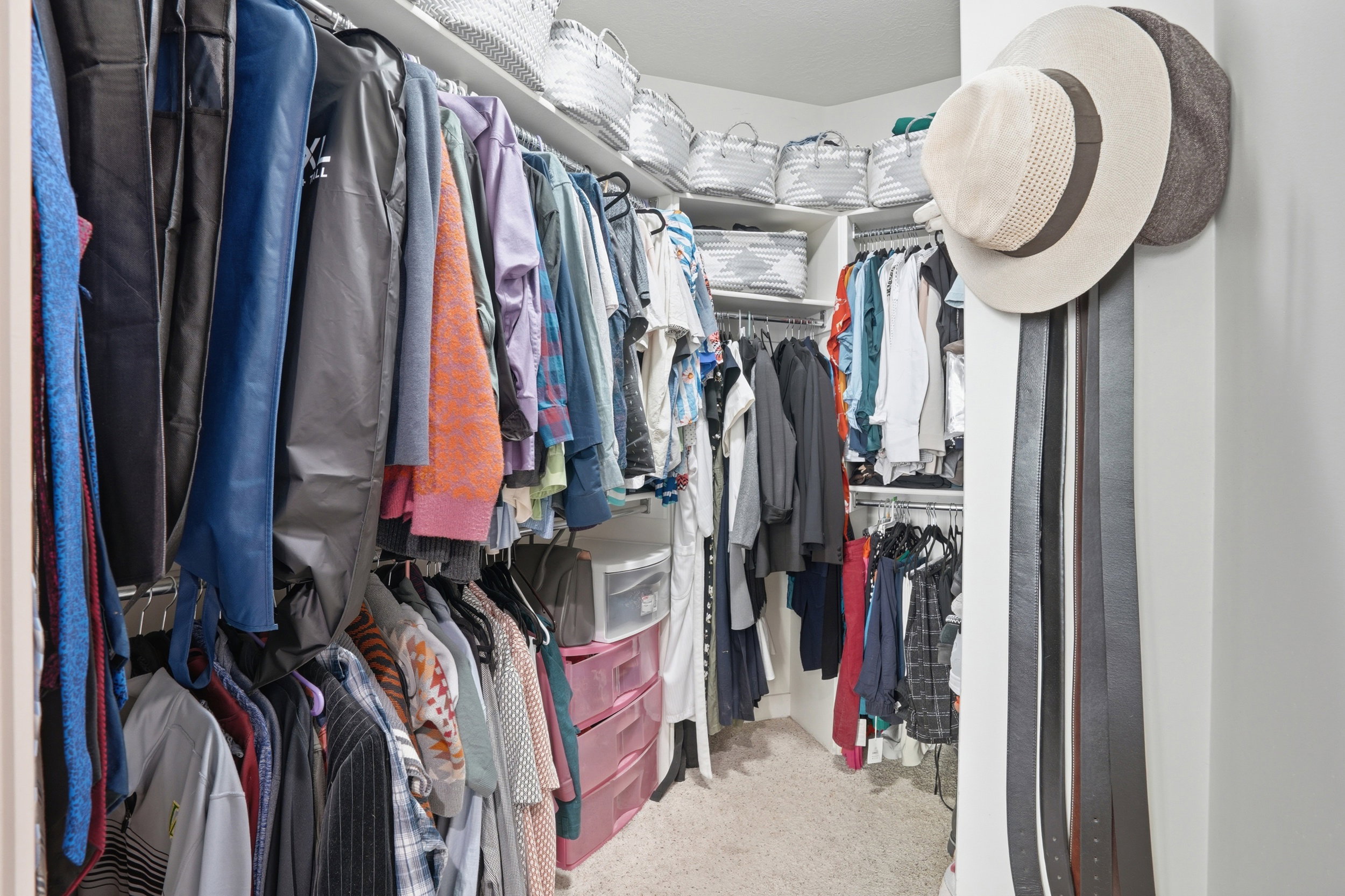 The Primary walk in closet has loads of space and shelving.