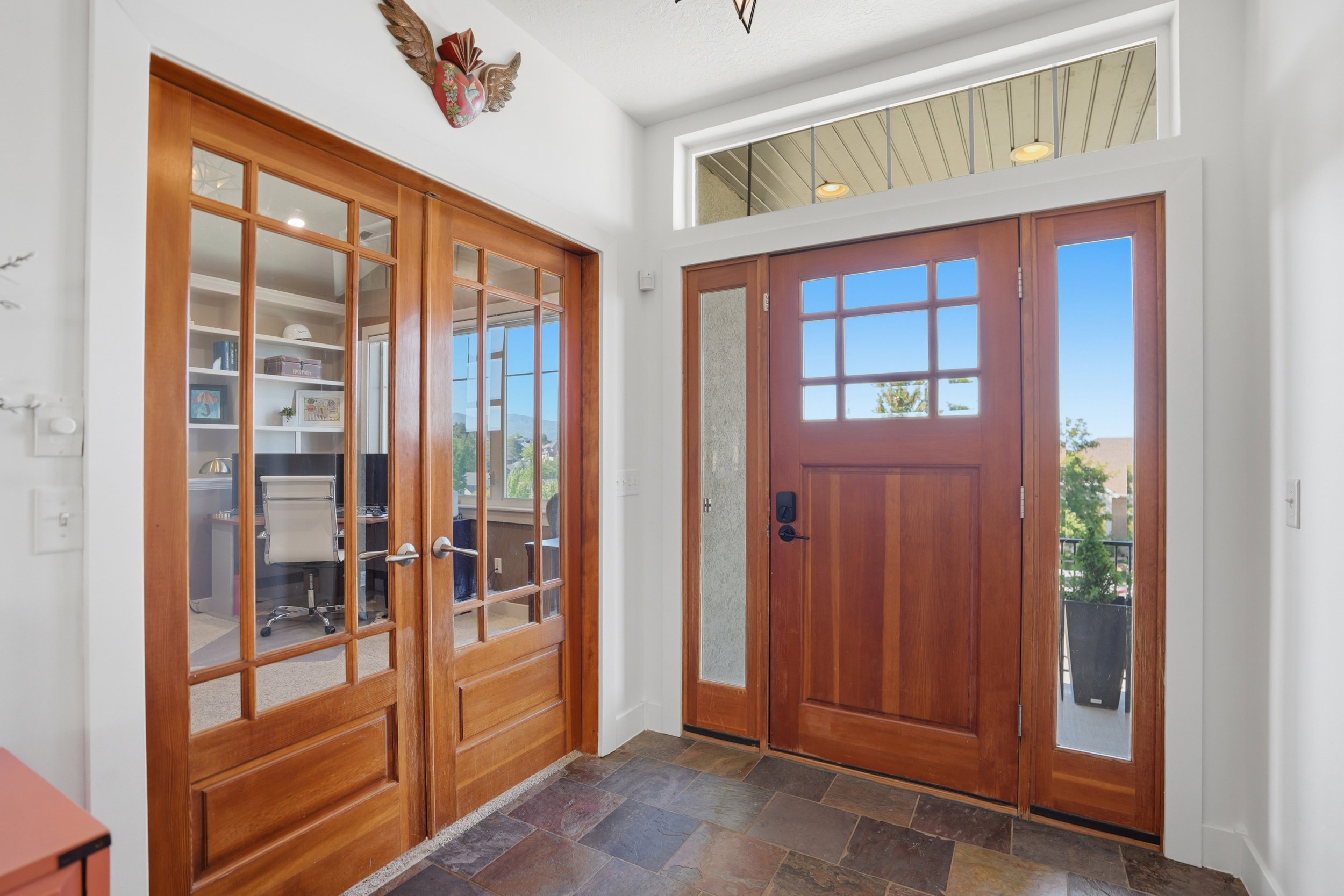 Beautiful office doors and office right off the  the front door home