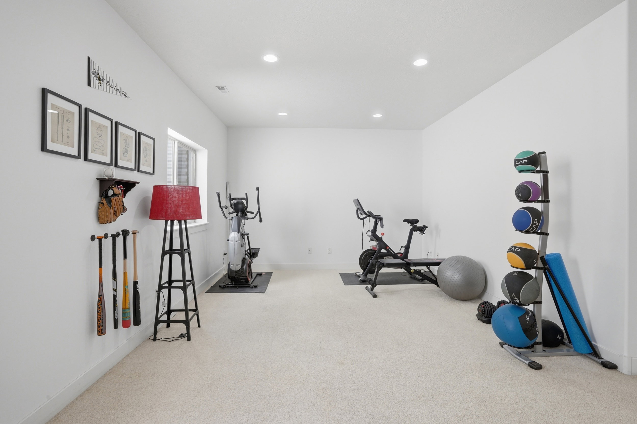 Well lit basement with big windows which bring in wonderful natural light