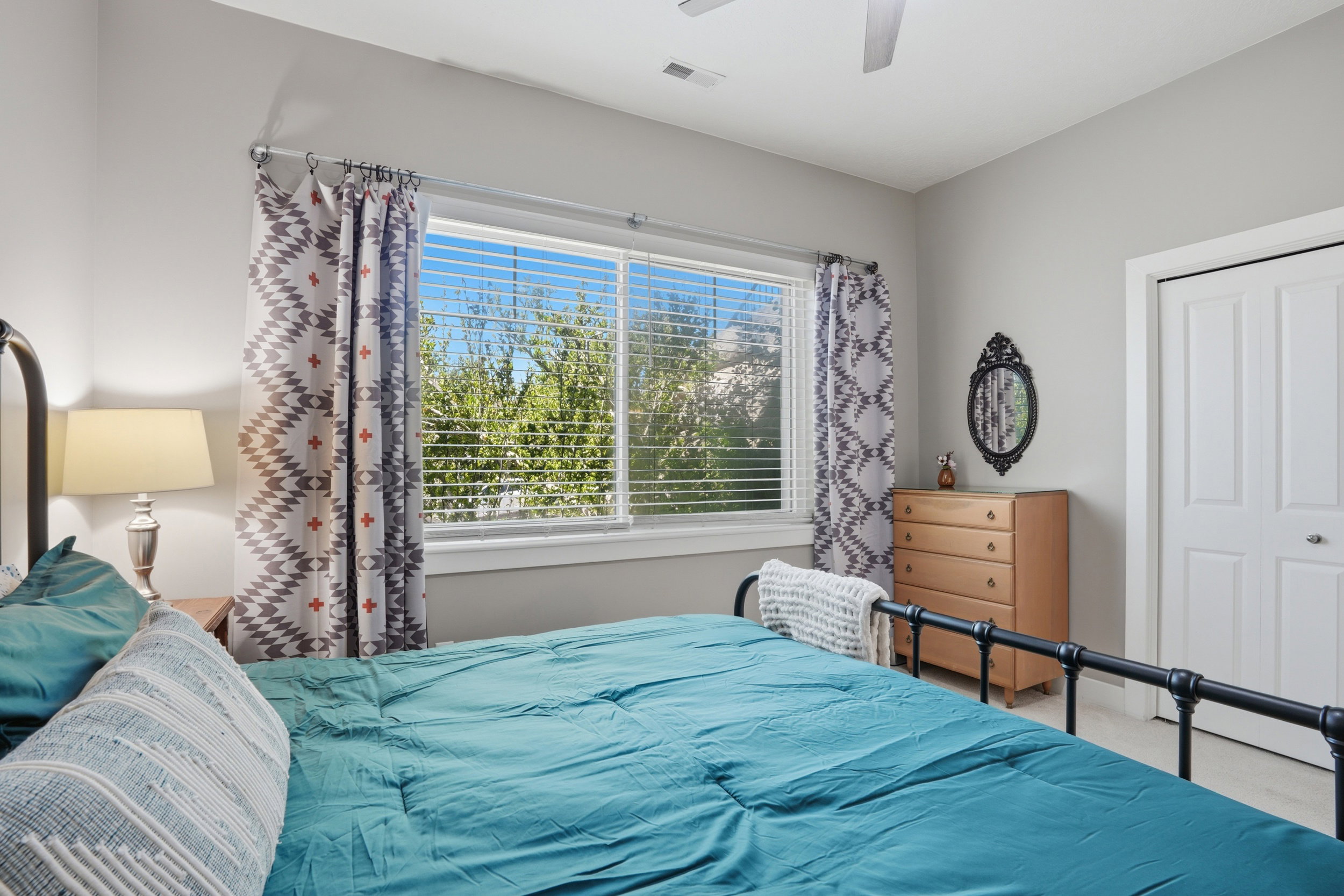 1st bedroom in basement. Light-filled room with good closet space