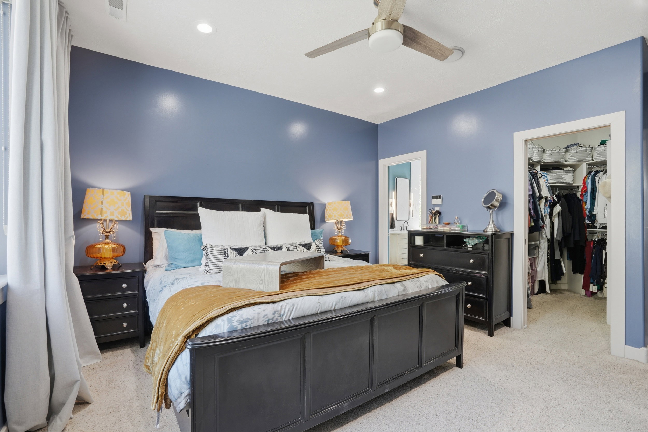 Enjoy your primary bedroom and attached remodeled bathroom with views from each room