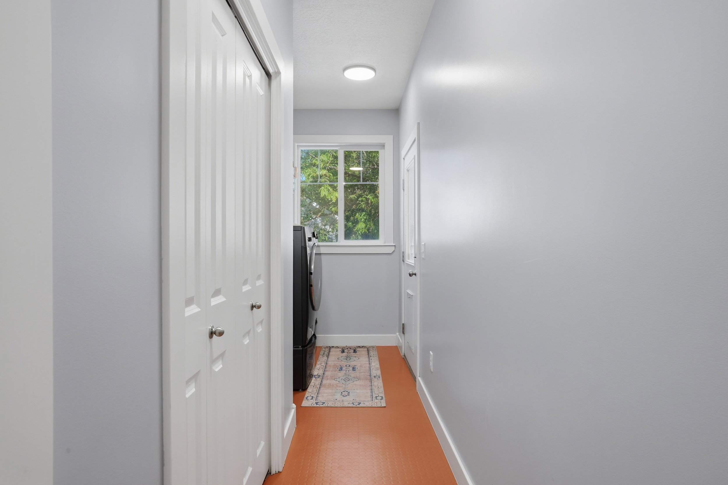 Off the kitchen is lots storage and the laundry area.
