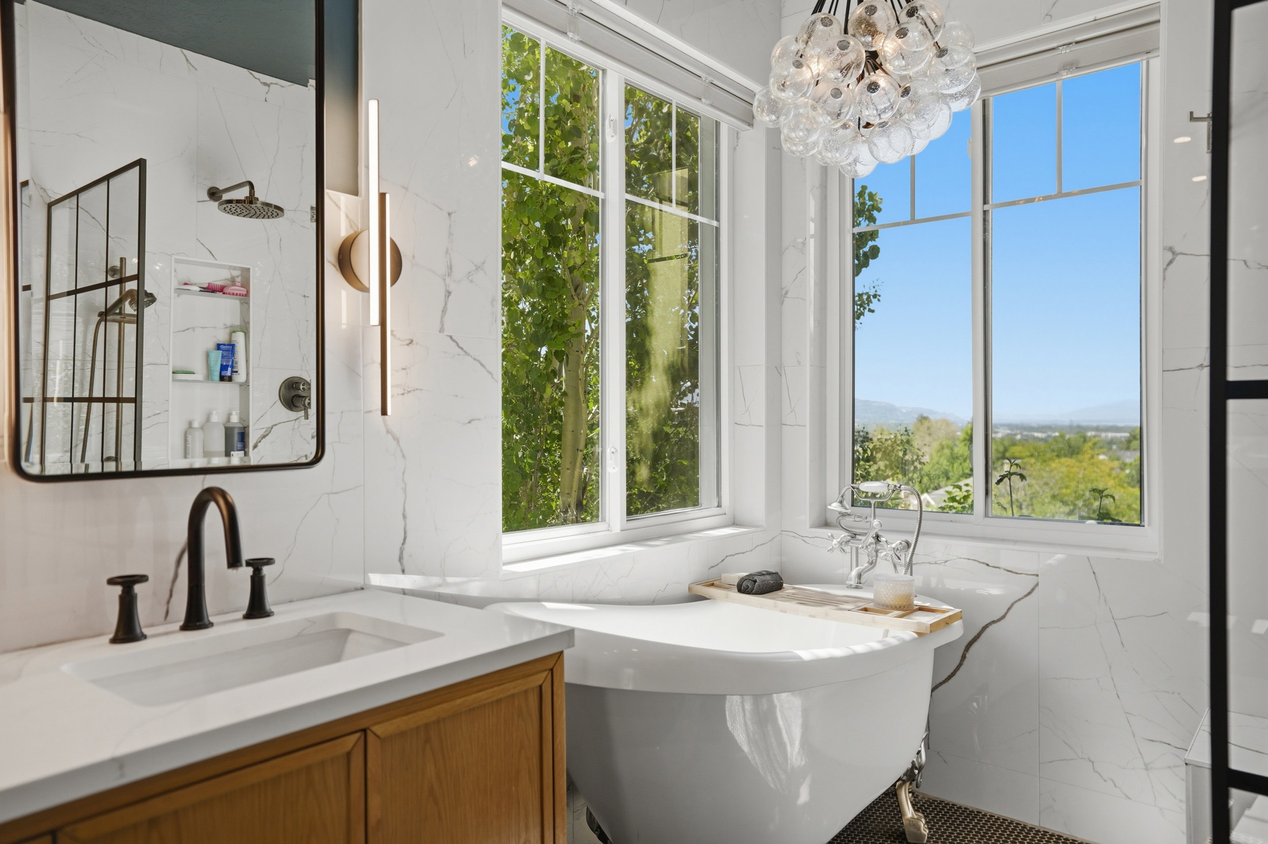 Barclay 62" acrylic tub with Barclay rim-mount tub faucet and stainless steel linear shower drains