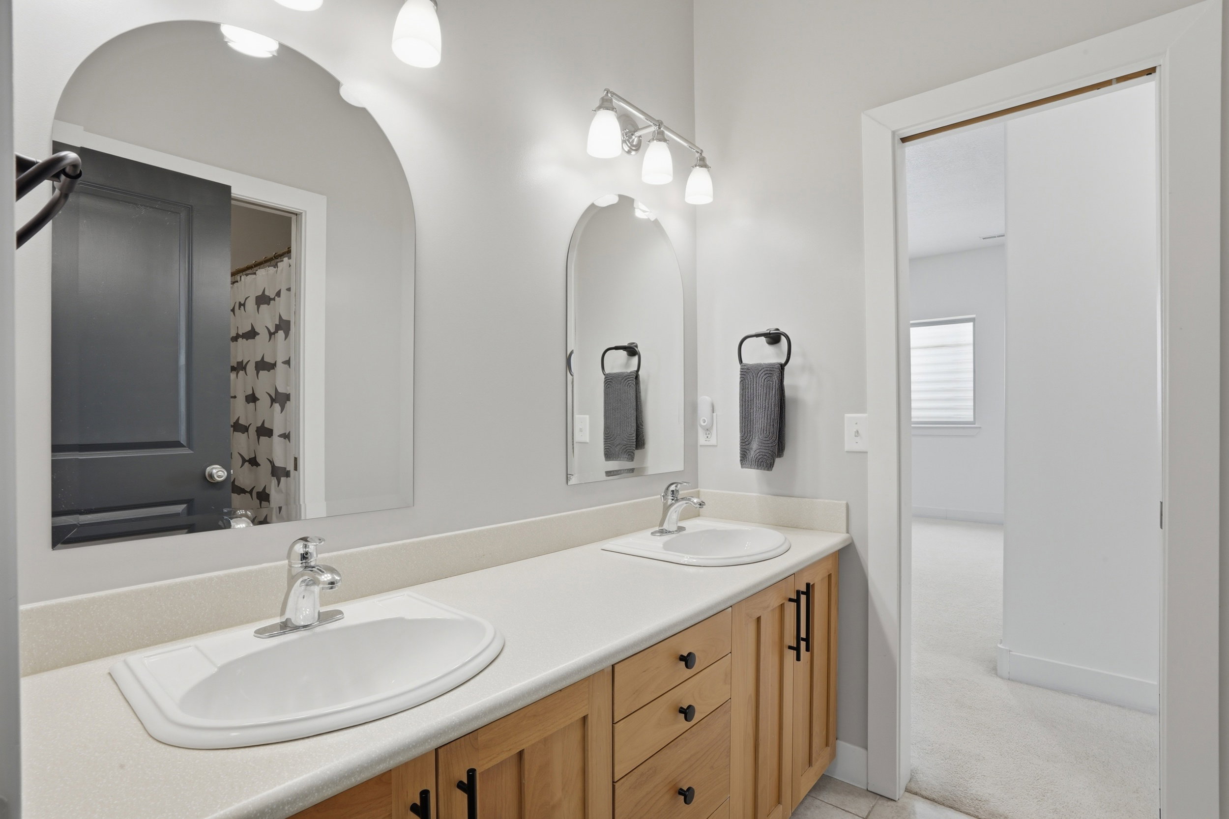 The great news about this bathroom is the toilet and shower have their own door. This means kids can be brushing their teeth while another is showering.