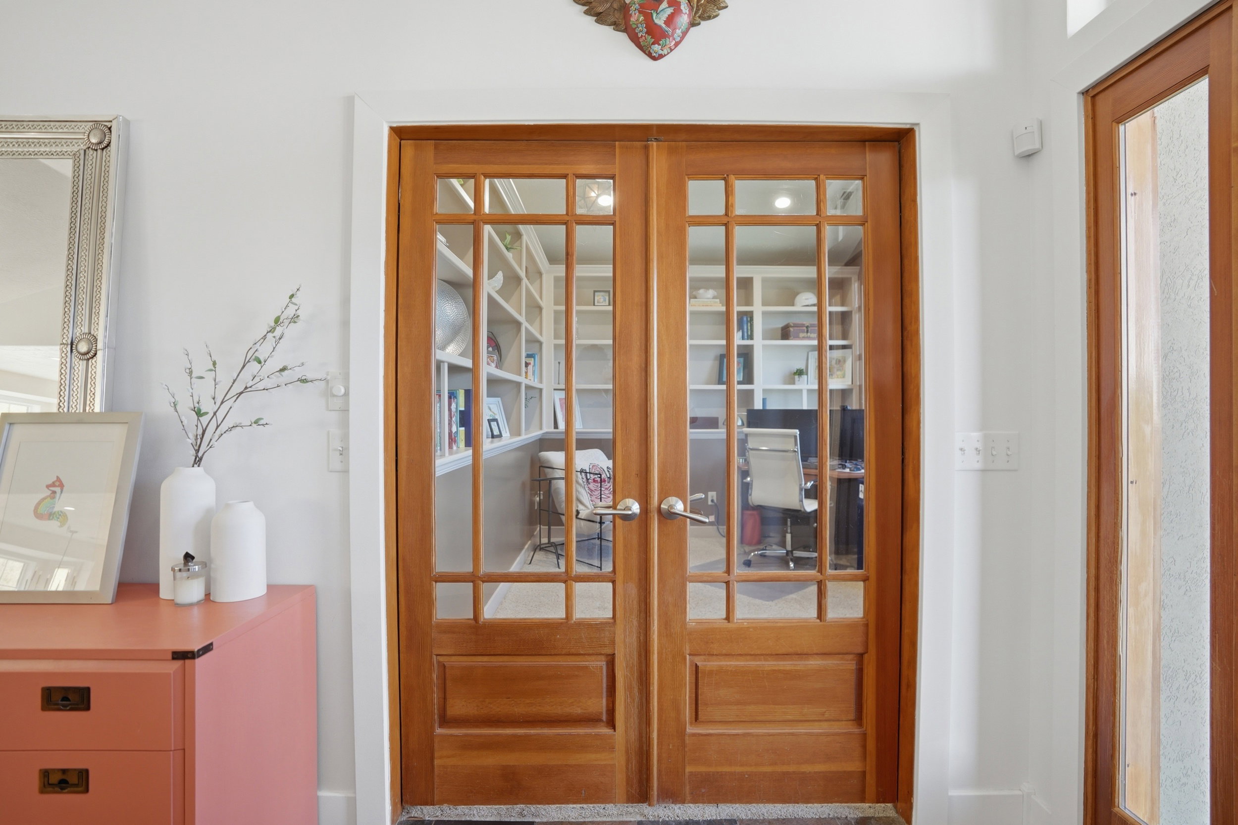 Solid wood French doors are your entrance to a serene office space