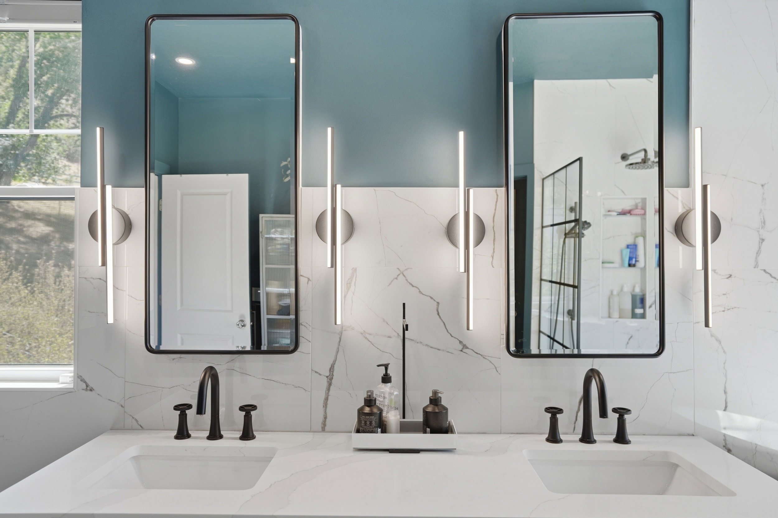 Natural oak vanity with quartz countertop...oh and did we mention the Japanese Toto bidet in the toilet room.