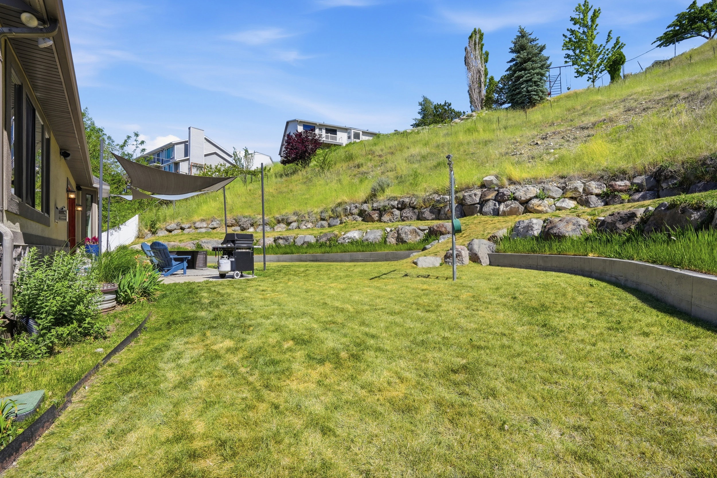 Terraced backyard with lots of wildlife.