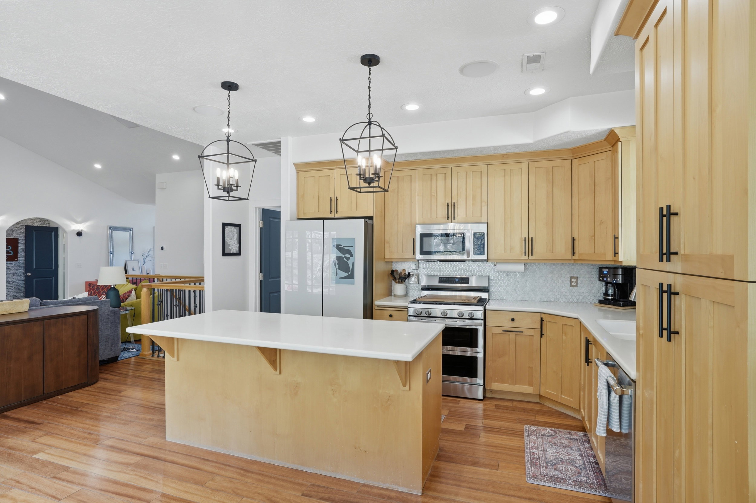 Open concept kitchen, new rod iron chandeliers and lots of good meals in your future